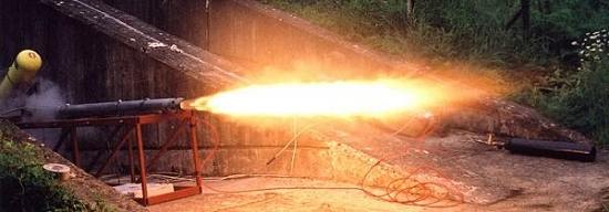 The B4 hybrid rocket motor being static test fired - June 2002